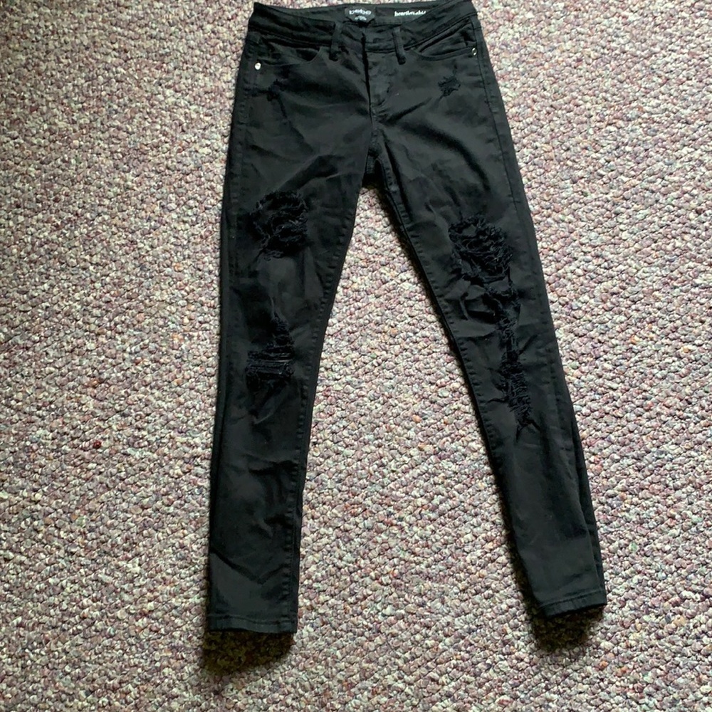 Cropped mid rise black ripped jeans